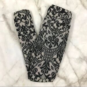 7 for all mankind lace print skinny jeans